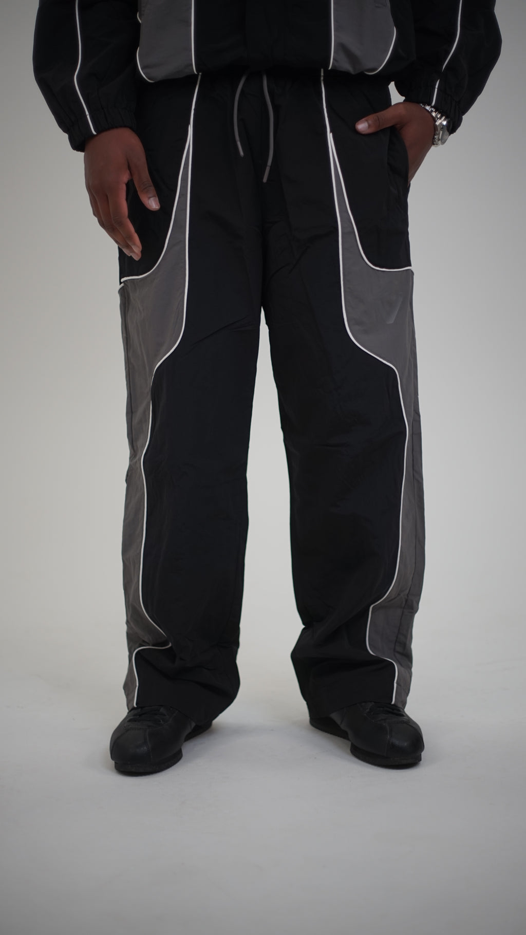 Track pants logo, men & women - Black and grey