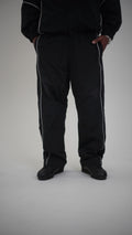 Track pants comment, Men & women - Black and white