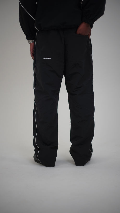 Track pants comment, Men & women - Black and white